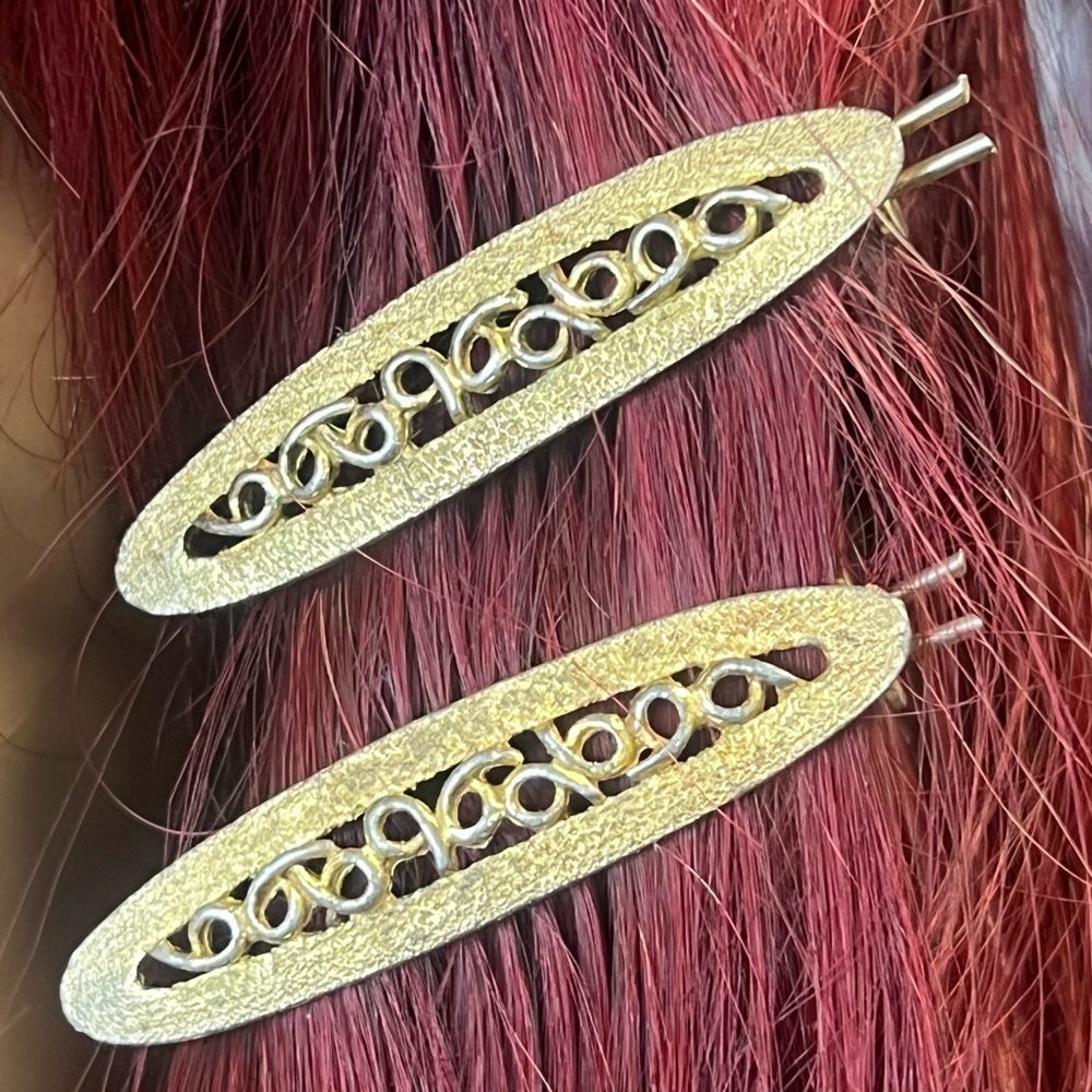 Pair of Vintage Golden Hair Clips with Intricate Design